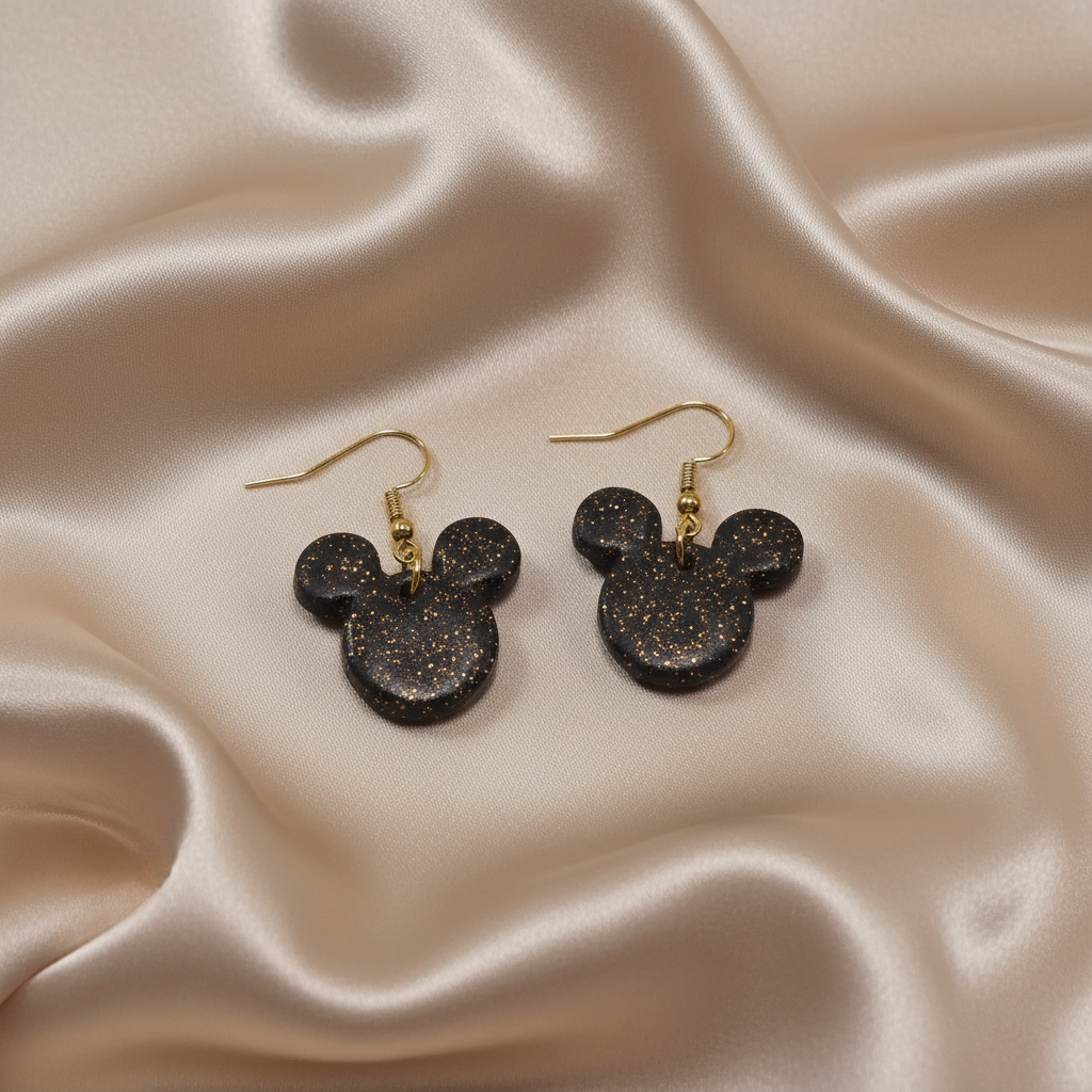 Black glitter Mickey Mouse silhouette dangle earrings with gold tone hooks