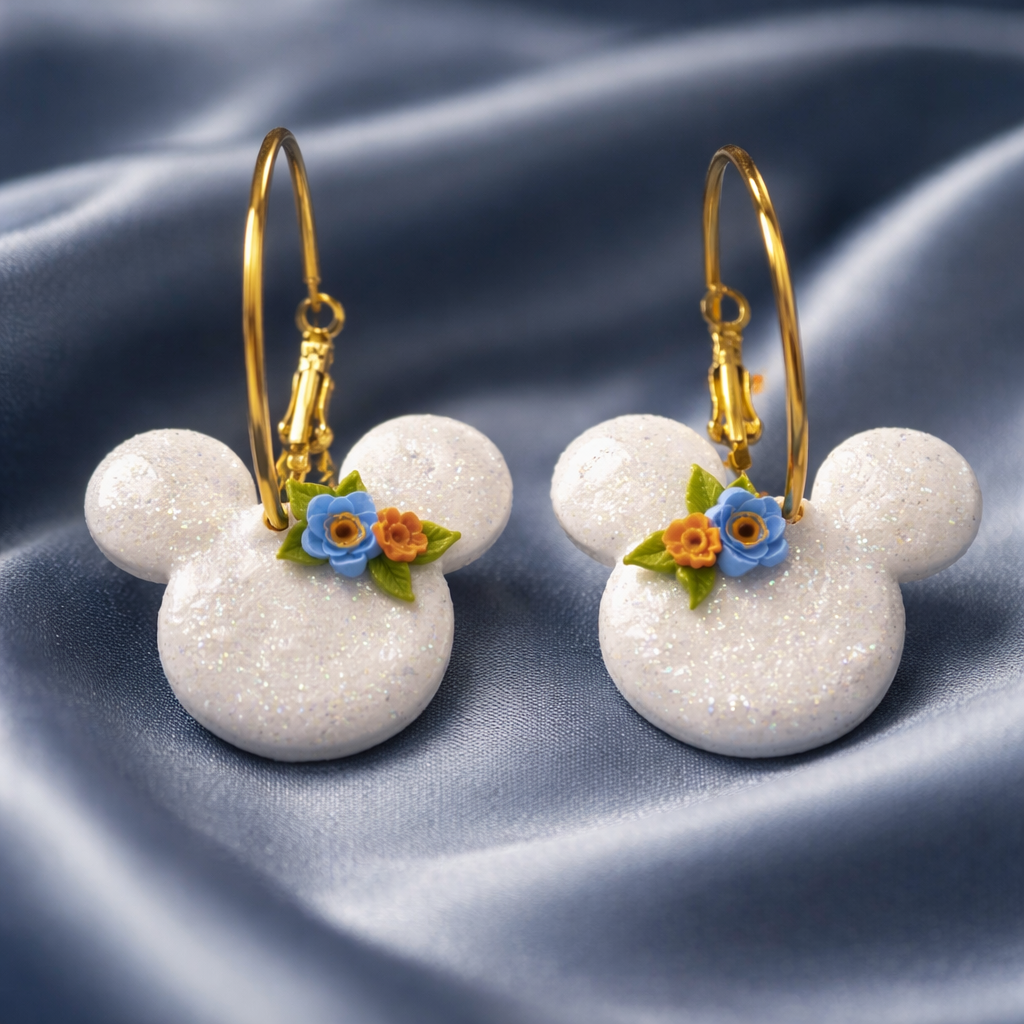 White glitter Mickey Mouse hoops with blue and orange flowers