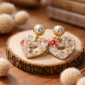 Sparkly floral heart drop earrings with pearl-style stud tops