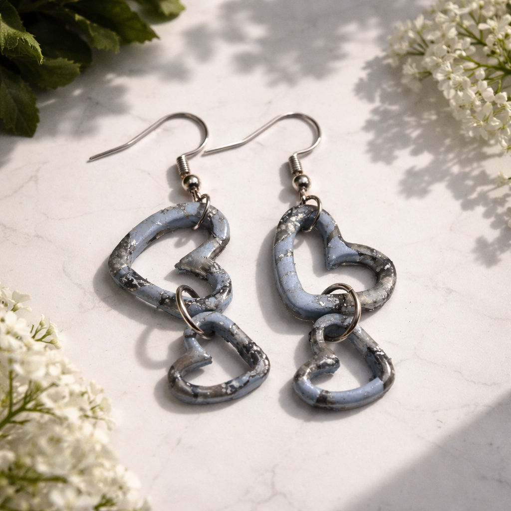 Blue and gray marbled double heart dangle earrings with silver hooks